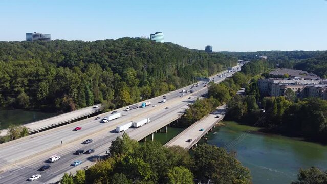 Drone shot of Interstate 285 and the Chattahoochee River in Vinings, Georgia.