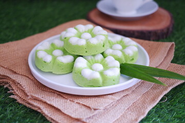 Kue Putu Ayu, a traditional Indonesian snack made from rice flour, pandan leaves, grated coconut then steamed.
