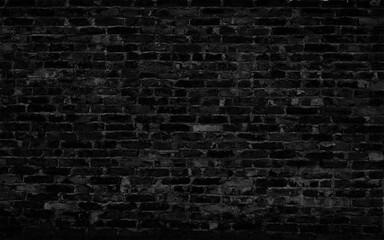 Fototapeta na wymiar Black brick wall seamless background. Black brick wall texture dark background
