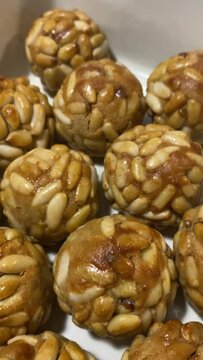 Pine nut panellets fresh from the oven. Typical snack eaten on the feast of All Saints in Catalonia. 