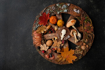 Wiccan witch altar on dark background. wheel of the year and magic things. esoteric spiritual...