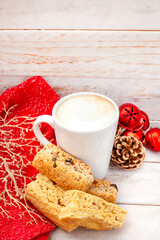 Traditional South African rusks with coffee on rustic wooden Christmas table