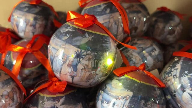 Clip of decorated christmas balls with yellow lights