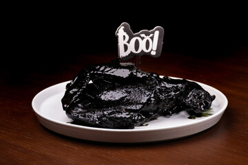Halloween themed dish with bat-like chicken wings