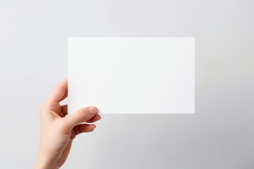 Fototapeta premium Close Up of Woman's Hand with Blank Paper