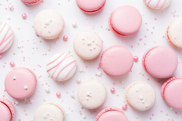 Obraz premium pink macarons pattern on a pastel pink background for a baby shower