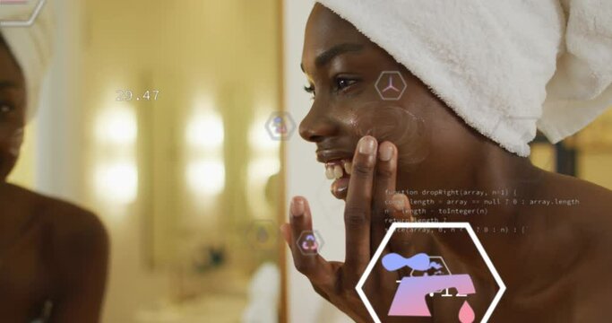 Animation of multiple icons over african american applying cream on face after taking bath
