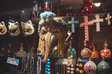 Venetian masks in store display in Venice. Annual carnival in Venice is among the most famous in...