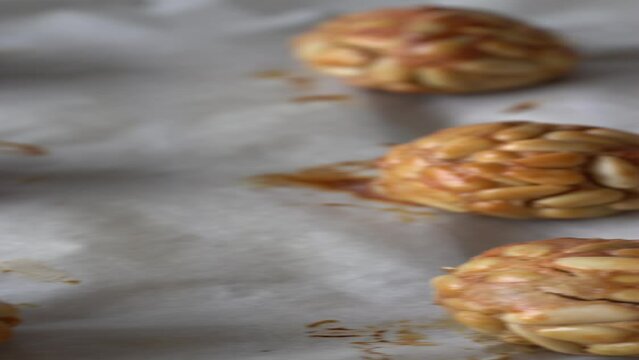 Typical snack eaten on the feast of All Saints in Catalonia. Pine nut panellets fresh from the oven. 