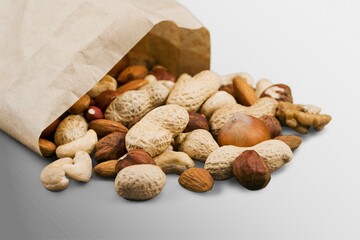 Mix of tasty dry nuts and fruits on the desk