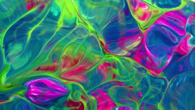 23.	This stock video features an extreme close-up shot of a thick mixture of colored paints spreading in slow motion.