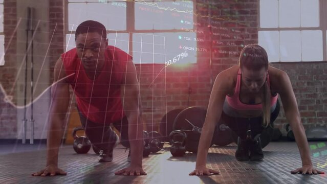 Animation of stock market data processing over biracial fit couple performing push ups at the gym