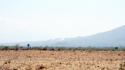 Climate change in Indonesia. Dramatic dusty barren savanna.