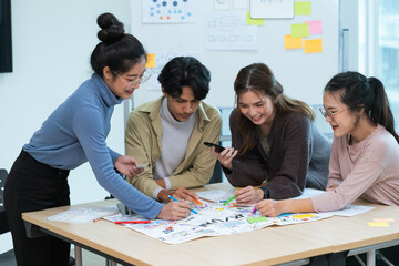 creative digital development agency brainstorming about mobile app interface wireframe design on desk at modern office