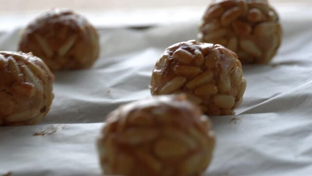 Pine nut panellets fresh from the oven. Typical snack eaten on the feast of All Saints in Catalonia. 