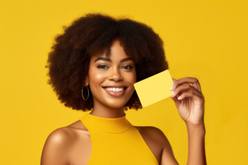 Winking woman holding credit card with hand isolated on yellow colored background. AI Generative