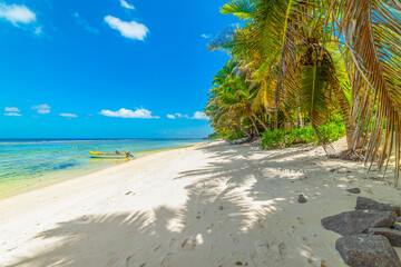Wooden boat in Anse Forbans beach