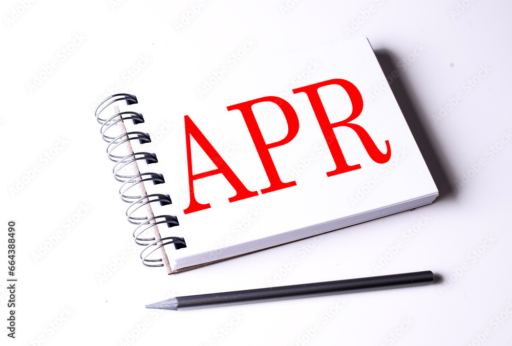 Poster text apr on notebook on the white background