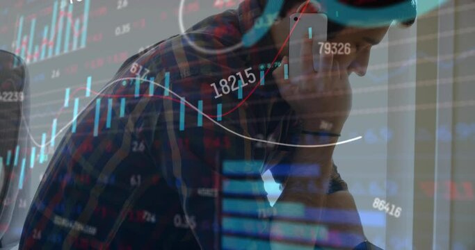 Animation of graphs and trading board over caucasian man looking at watch while talking on cellphone