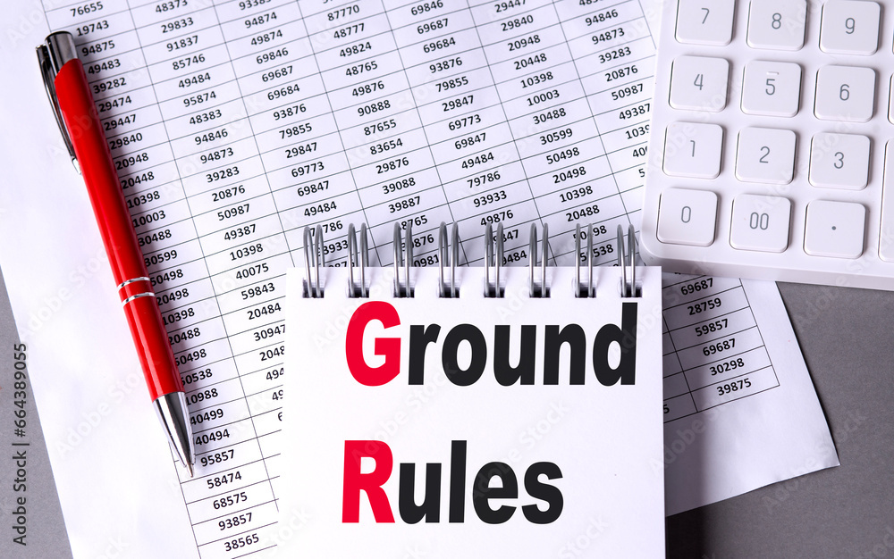 Poster ground rules text on notebook with pen, calculator and chart on grey background