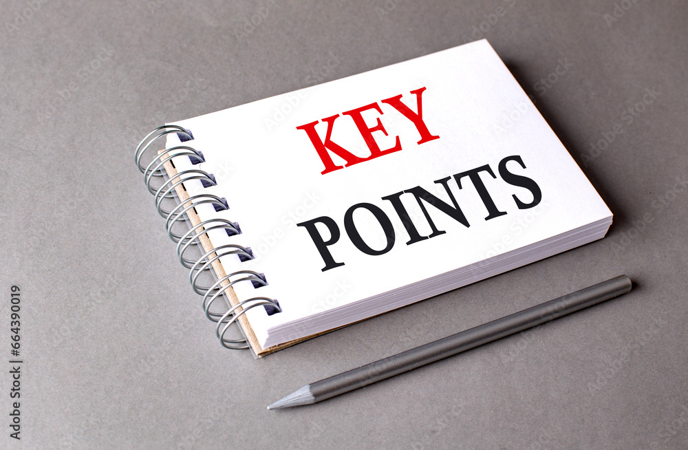 Aufkleber key points word on notebook on grey background