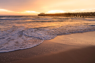 Beautiful Romantic Sunset sea sand beach. Landscape of paradise tropical island beach, sunrise shot. beach landscape. Beautiful cloudscape over the sea sunrise shot.
