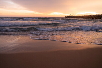 Beautiful Romantic Sunset sea sand beach. Landscape of paradise tropical island beach, sunrise shot. beach landscape. Beautiful cloudscape over the sea sunrise shot.