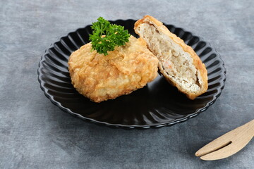 Tahu Bakso, Indonesian traditional snack made from tofu and beef. Served in white plate.
