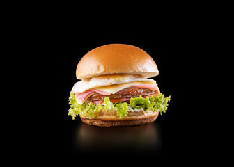Super tasty hamburguer. Hamburguer on Brazilian style. Studio shoot isolated on back background.