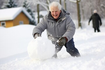 man playing with snow