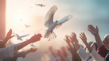 Fotobehang Demonstrators releasing white doves as a symbol of peace during a protest © basketman23