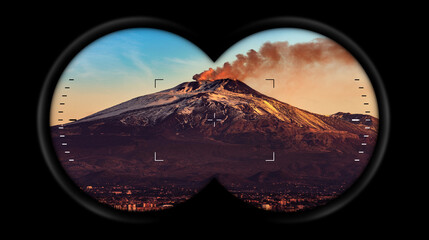 Binoculars point of view with the Mount Etna Volcano with smoke at dawn, Catania cityscape, Sicily...