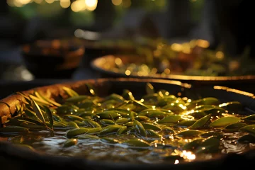 Fototapeten process of pressing olive oil © mitarart