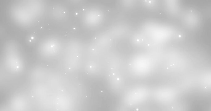 Animation of white glowing spots falling on grey background