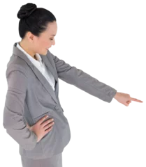 Fotobehang Aziatische plekken Digital png photo of happy asian businesswoman pointing finger on transparent background