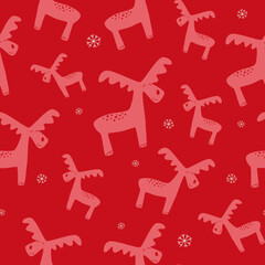 Christmas and winter themed seamless pattern, with reindeers and snowflakes on red background