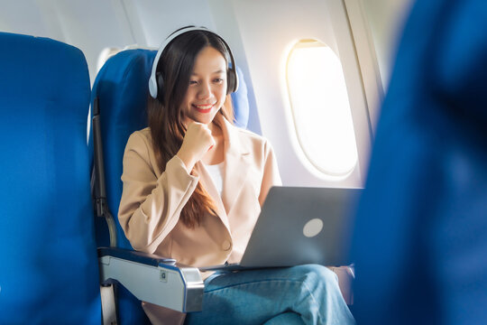 Female airplane passengers, study abroad, asian chinese people, foreign university student passengers preparing for overseas studies. dreams taking flight, global campuses await. english languages