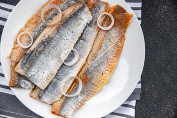 fish salted herring fresh seafood eating cooking meal food snack Pescetarian diet on the table copy space food background rustic top view