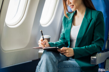 Female airplane passengers asian chinese people Entrepreneurs on Flight, Venturing Overseas Investments. Global Business Expansion, Foreign Markets, Strategic Financial Moves. Women in Business Suits