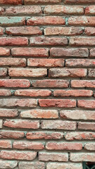 various wall patterns and windows made of red brick