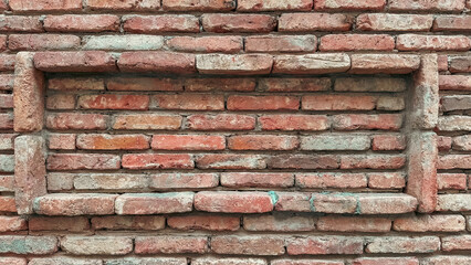 various wall patterns and windows made of red brick