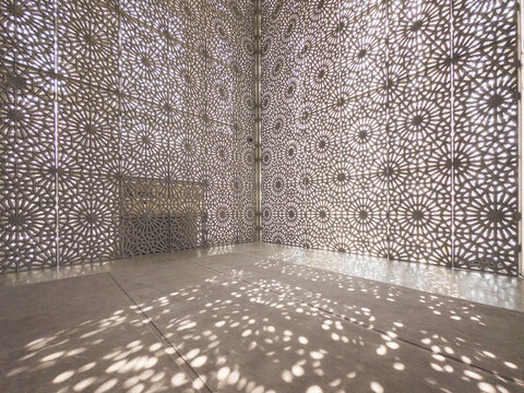 Shadows of the mashrabiya patterned interior of The Ahmed El-Tayeb Mosque at the The Abrahamic Family House situated in the Saadiyat Island Cultural District, Abu Dhabi	