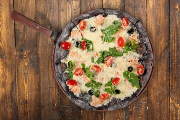 Tasty hot Pizza with cheese and fresh basil