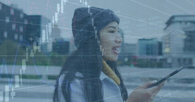 Animation of financial data processing over asian woman talking on smartphone on the street