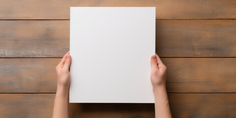 person holding blank paper