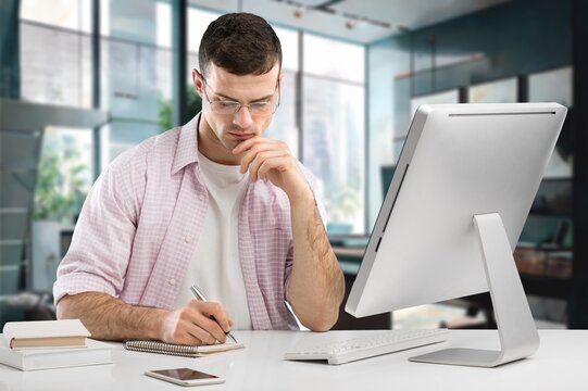 Serious handsome man doing job in office, AI generated image