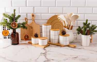 Beautiful New Year kitchen background with a set of kitchen utensils and jars for storing food,...