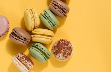 Assortment of colorful macarons, top view