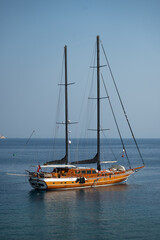 Beautiful wooden sail boat anchored by the coast of Datça, Turkey