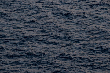 Dark melancholic water, concept of sadness in the ocean